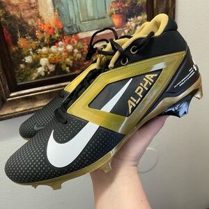 Nike Alpha Menace 4 Pro Black Metallic Gold cleats